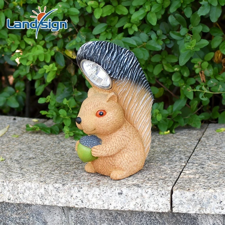 new design lovely animal shape waterproof spotlight squirrel solar light with pine nut in hands