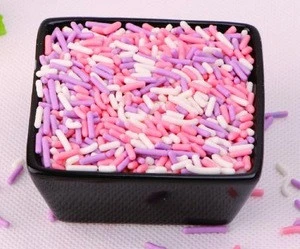 Pink needle shape jimmies for cake decoration