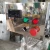 Import Small Scale PET Plastic Glass Bottle Liquid Filler 12 Heads Semi Automatic Filling Machine from China