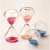 Import Wholesale beautiful home decor glass sand timer/hourglass from China
