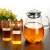Import 1.6L/54oz High Borosilicate Juice &amp; Tea Glass Water Pots with Stainless Steel Lid and Handle from China