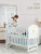 Import A cradle-type crib that can be spliced into a large bed  Removable solid wood crib  White new childrens bed from China