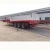Import Heavy duty 3 axle tractor truck 40ft flatbed shipping container trailer from China