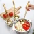 Import Hot Pot Gold Spoon Rest Standing Rack with Ceramic Bowl Kitchen Tableware Tool from China