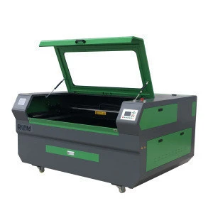 Laser cutter and engraver auto feeding system