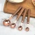 Import Manufacturer wholesale walnut handle copper plating measuring spoon measuring cup kitchen baking tools measuring spoon from China