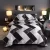 Import microfiber simple geometric design home twin queen king size quilt comforter sets for sale from China