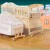 Import Natural Wood Color Baby Cradle Infant Rocker Sleeper and Baby Crib with Storage Drawers from China