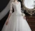 Import W1001 women mid long sleeve vestido de amazing bandage lace wedding dress wedding gown bridal dress without veil from China