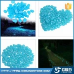 Blue glow paving stone in night glow in the dark pebble stone