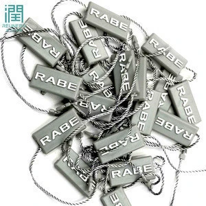 Custom Brand Embossed Logo Plastic String Seal Clothing Tags for Hang Tag -  China Seal Tag, Plastic Tag