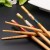 Import Hot Sale Bulk Cheap Prices Japanese Korean Style Printed Reusable Bamboo Wood Sushi Chopsticks from China