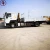 Import HOWO RHD 4X2 266HP truck mounted Crane 15ton folded crane from China