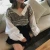 Import Korean fashion fake two-piece Lantern shirt sleeves women v-neck plaid sweater from China