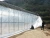 Import Low cost commercial greenhouses single tunnel agricultural green house hot galvanized steel frame hoop house from China