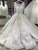 Import Luxury Long Sleeve Embroidered Design Pleated Puffy Skirt Ball Gown Floor Length Wedding Dress With Train from China