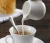 Import mini ceramic milk jug white porcelain milk pot sugar creamer pot from China