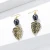Import SophiaXuan Holiday Black Pearl Long Earrings 14K Gold Plated Flower Pendant Women Hawaiian Jewelry Earrings from China