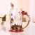 Import Wholesale Gift Enamel Glass Rose Tea Coffee Enamel Glass Cups With Handle from China