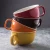 Import Yellow/black/red/orange color glazed factory stocked ceramic cup porcelain coffee/milk barware mug from China