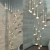 Import 0-10v dimming Nordic creative led pendant light golden luxury led lighting vertical stair led chandeliers and lamps from China