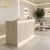 Import Minimalist Wood Grain Reception Desk With Ambient LED Light Modern Front Counter For Beauty Salon Spa Nail Salon from China