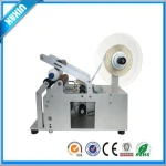 Semi automatic round labeling machine