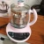 Import 800W 1.8L automatic up and down function model GM-TM001 special design glass electric pot tea maker from China