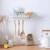 Import Adhesive Wall Mounted Plastic hanging shelf for kitchen bathroom sundries storage with hook from China