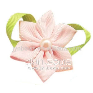 Beautiful pink and green knitted hairpins with ribbons