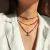 Import Bohemia Style Women Handmade Multilayer Stackable Summer Beach Irregular Pearl Choker OX Horn Pendant Colourful Beaded Necklace from China