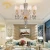 Import China modern luxury gold indoor plated glass hanging led classic chandeliers pendant lights from China