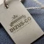Import Eco Friendly High Quality Garment Accessories Hang Tag Embossed Hangtag from China