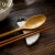 Import High grade white ceramic chopstick holder / chopstick and spoon rest with gold rim from China