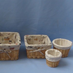 Hot cheap china supplier small split wicker fabric storage basket wholesale set of 4 with cream liner and flower liner