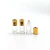 Import hot sale 3ml attar glass perfume bottle with with plastic ball and colorful aluminum  diamond cap from China