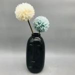 Low price white and black human face decorative vases porcelain