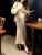 Import New Arrival Autumn Hermann Curve Temperament French Women Knitted Dress Wool V-neck Slim Bottoming Dress For Women from China