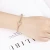 Import New style stainless steel bracelet with pulling zircon  Womens 18K Gold Plated Rose Bracelet from China