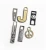 Import OEM Wholesale New Design Custom Logo Alloy Metal Zipper Puller Slider bag zipper puller from China