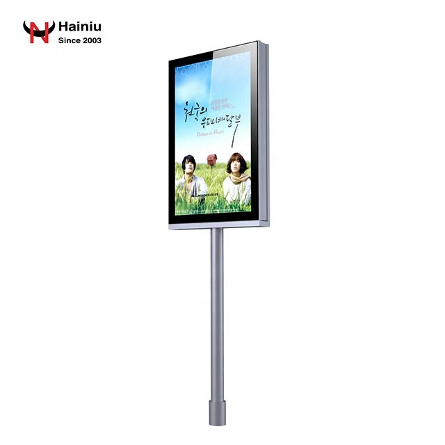 Street pole light box with scrolling system and digital clock