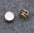 Import Two holes Zinc alloy cylindrical spring buckle for garment accessories from China