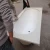 Import White acrylic stone home bathtub with armrests wholesale price from China