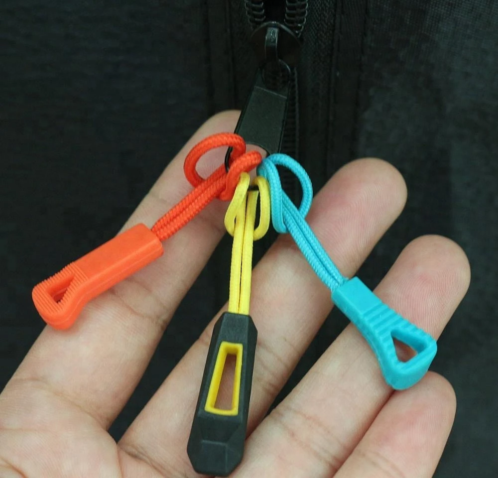 Wholesale factory cheap custom embossed logo hard plastic rubber zipper puller