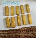 gold bars and rough diamonds