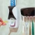 Import best-selling creative self-motion toothpaste dispenser toothbrush holder Bathroom products from China