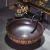 Import classical europe style round shaped solid surface matt black table wash basin from China