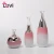 Import Devi luxury cosmetic glass bottle packaging 50g 100ml 150ml pink lotion bottle pump spray bottle glass cream jar from China
