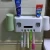 Import Family Use Electric Toothbrush holder USB  with Two Toothpaste Dispenser Automatic for Bathroom from China