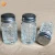 Import good quality round 50ml 1.5oz 80g chilli flour cumin edible salt pepper spice bottles glass with shaker lid from China